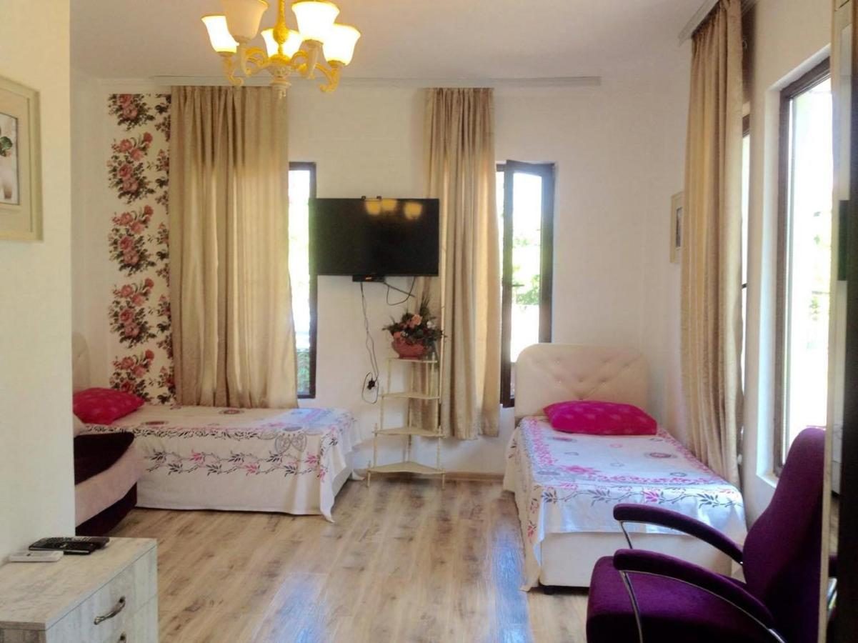 Twin room with two single beds and a balcony